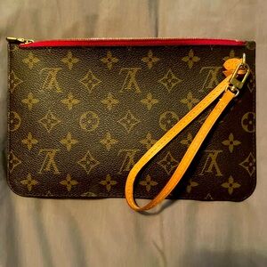 Louis Vuitton neverfull wallet. LV print, hot pink inside. Used- like new.
